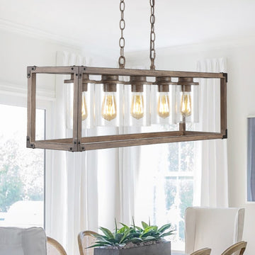 Zeniba 36" Linear Adjustable Iron/Seeded Glass Rustic Farmhouse LED Pendant - JONATHAN Y